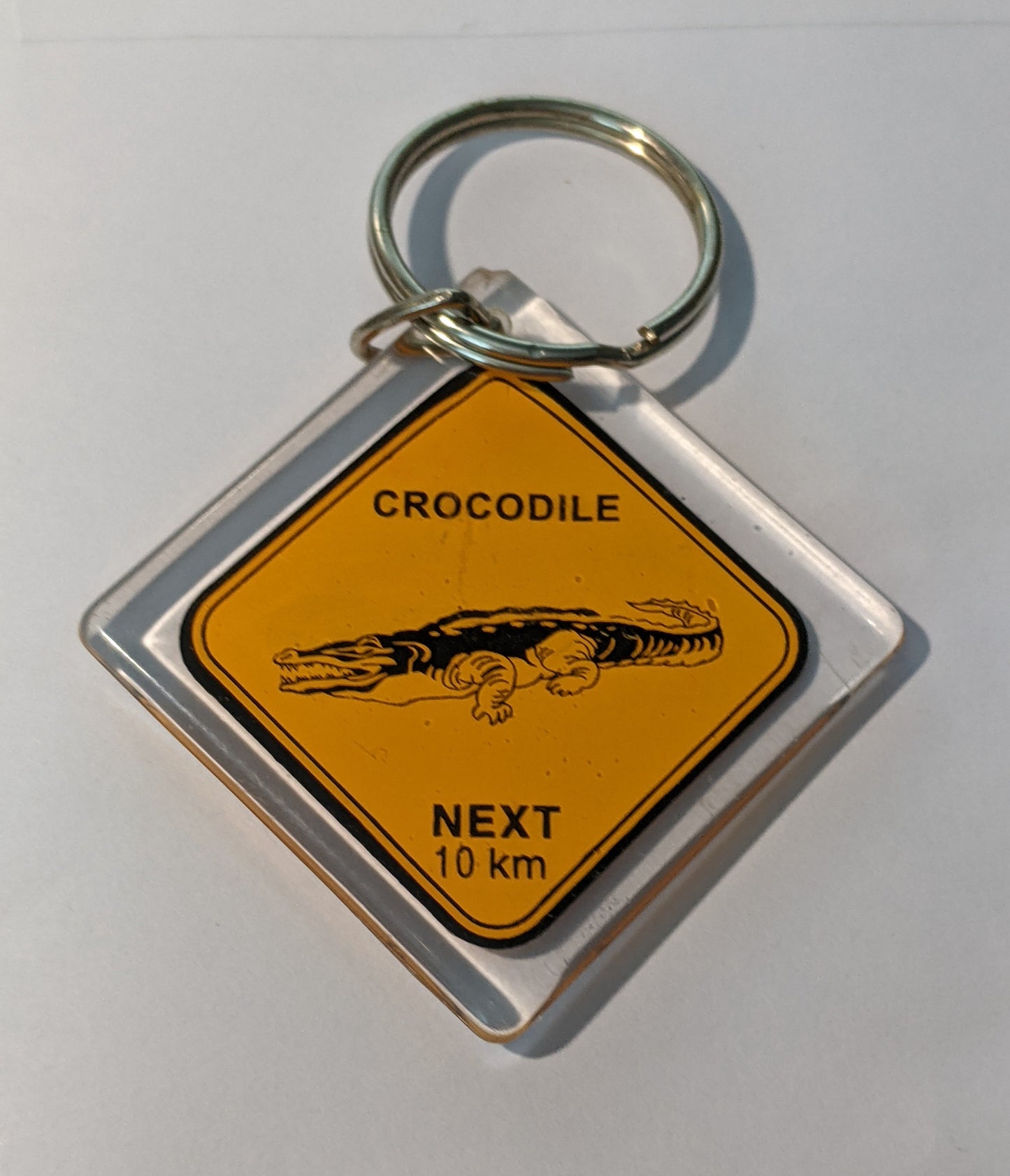 LP888 Vintage Crocodile NEXT 10km Signboard Orange Color Keychain (B507)