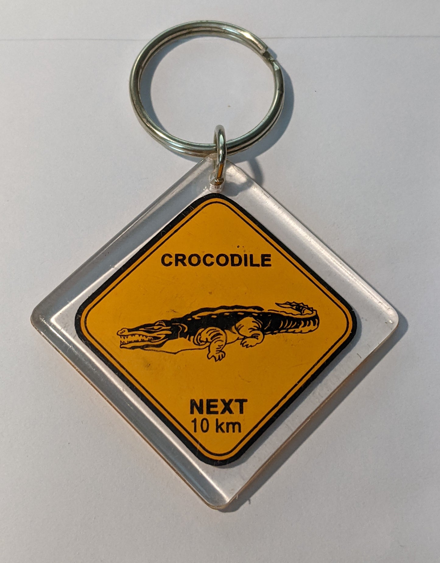 LP888 Vintage Crocodile NEXT 10km Signboard Orange Color Keychain (B507)